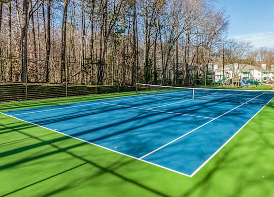 Open Tennis Court at Bridges at Mallard Creek Apartment Homes, Charlotte
