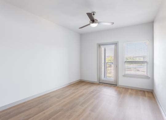 unfurnished bedroom with ceiling fan