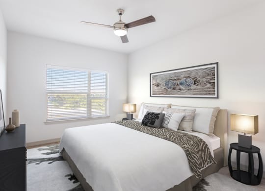 furnished bedroom with ceiling fan