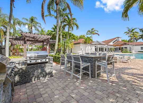 grilling station with table and chairs