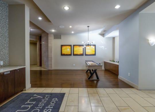 Resident lounge area with shuffleboard table