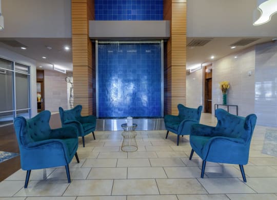 Lobby of leasing office with blue chairs