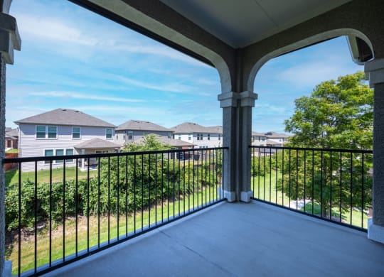 Covered balcony facing outside landscape