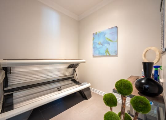 Resident tanning bed with private room and decor