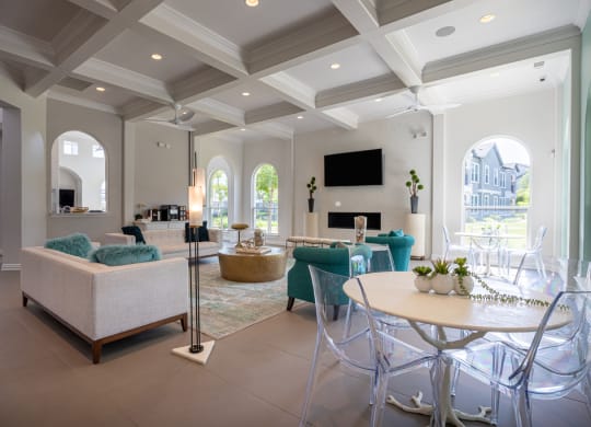 Resident clubhouse common area with couches and chairs