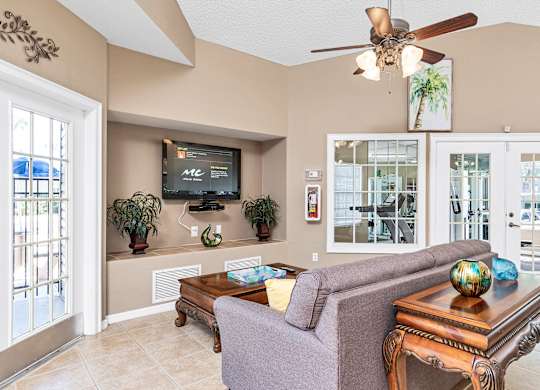 Interior of resident clubhouse facing television lounge area