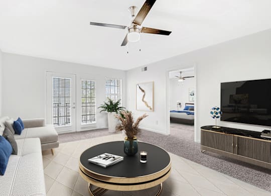 Living Room With TV at Caveness Farms Apartments, North Carolina, 27587