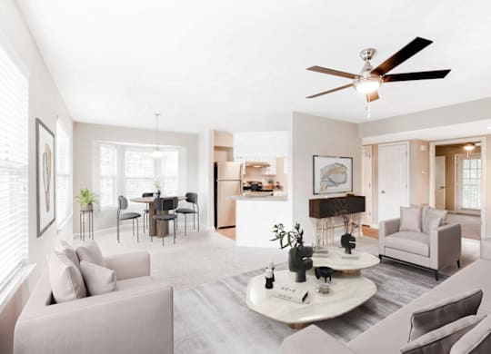 a living room with couches and a coffee table at Caveness Farms Apartments, Wake Forest, NC 27587