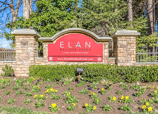 an image of the elan walnut creek sign at the front of the property