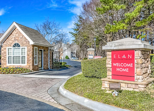 a house with a welcome home sign in front of it