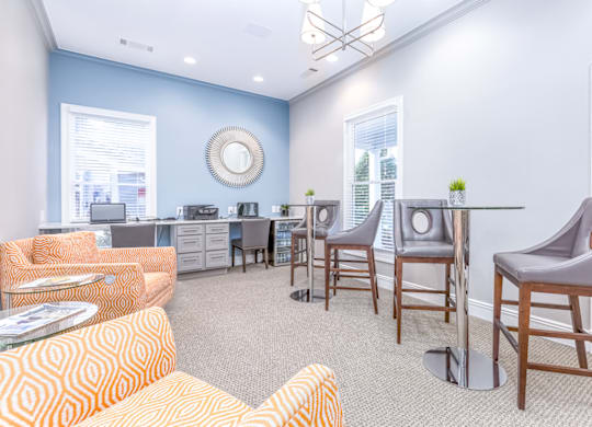 the reserve at bucklin hill leasing office with couches and chairs