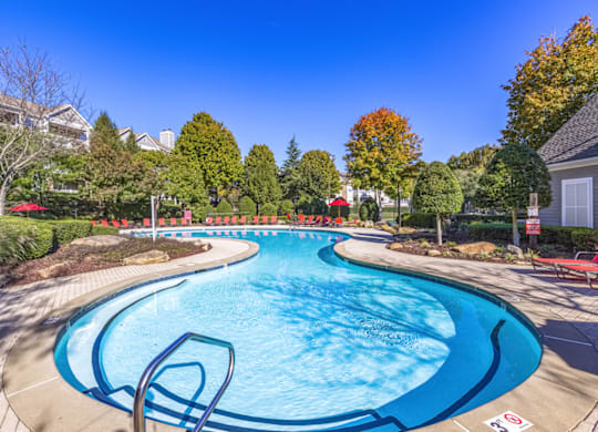 take a dip in the resort style pool at the enclave at woodbridge apartments in sugar land