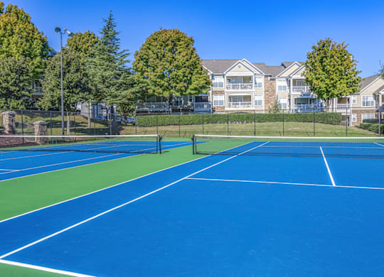 take a swing at one of our tennis courts