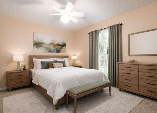 A bedroom with a bed, nightstands, and a painting on the wall.