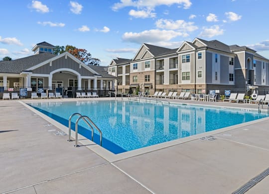 A large swimming pool in front of apartment buildings at Litchford 315 Apartments, Raleigh, NC