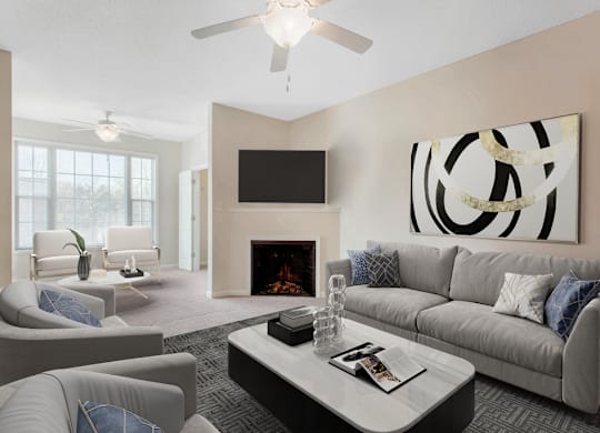 staged living room with carpeted flooring, ceiling fan, and fireplace at Ashley Court Apartments, Charlotte, 28262