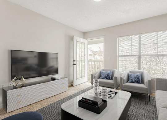 Living Room With TV at The Grayson Apartment Homes, Charlotte