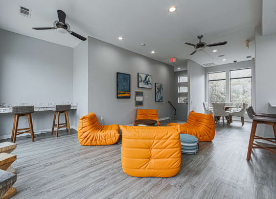 clubhouse with an orange couches