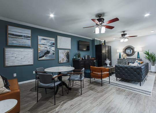 clubhouse lounge area with couch and table seating