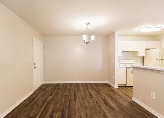 A dining room with wooden floors
