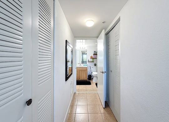 hallway leading to a bathroom
