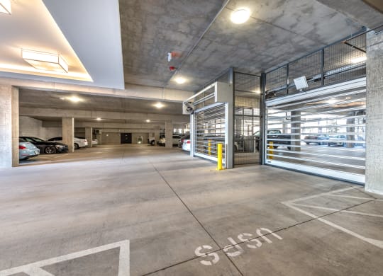 Parking garage with metal gate on right side