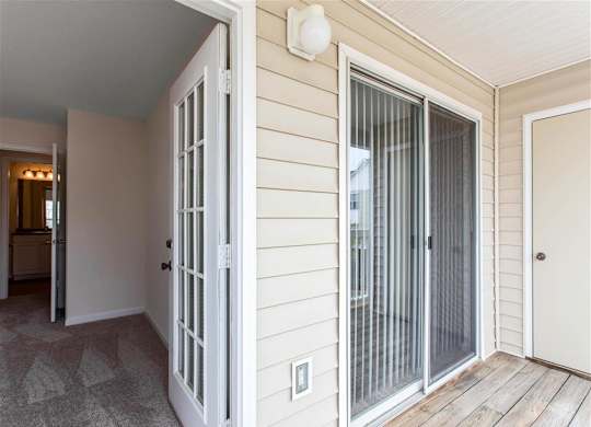 Private Balcony  with French Door to Bedroom and Sliding Glass Door
