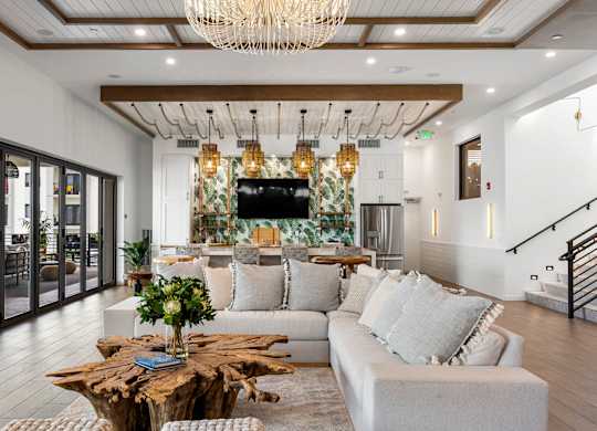 a living room with a couch and a table