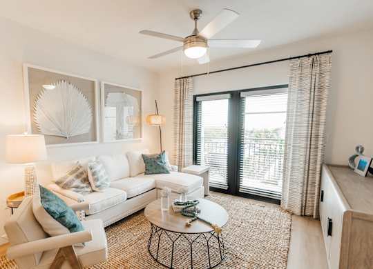 a living room with a couch and a table