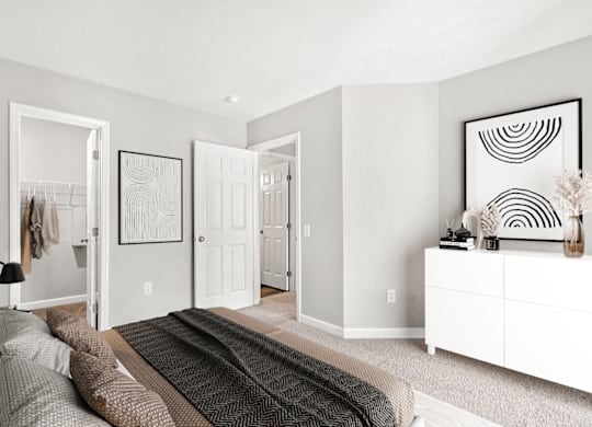 A room with a grey carpet and a white dresser at Paces Pointe Apartment Homes, Matthews, NC, 28105