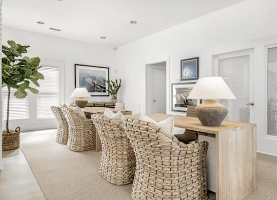 A room with a long table and chairs at Paces Pointe Apartment Homes, Matthews