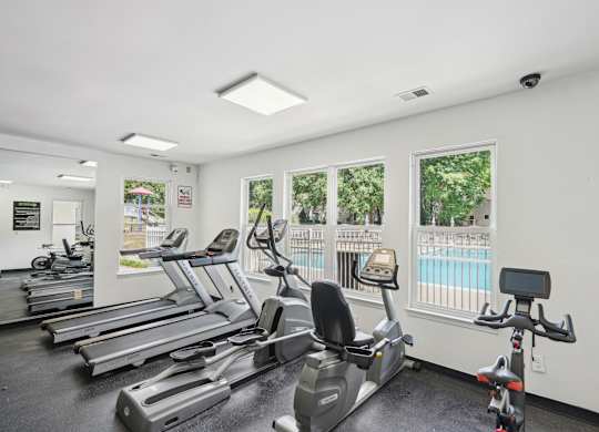 A gym with treadmills and exercise bikes at Regency Park Apartment Homes, Raleigh, NC