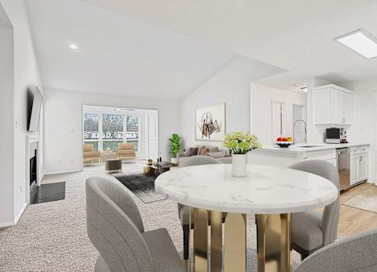 A modern living room with a white marble table and grey chairs.