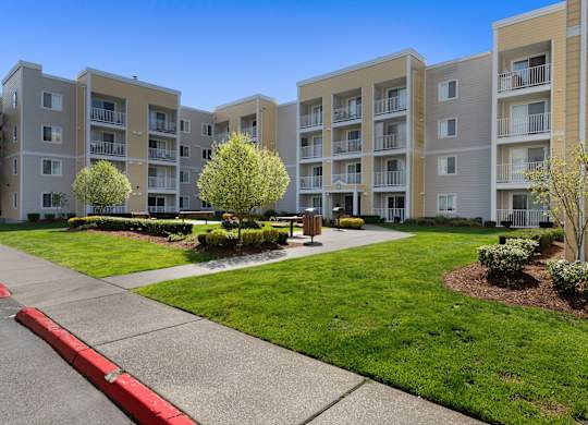 an exterior view of an apartment building  at Camelot Apartment Homes, Everett, Washington