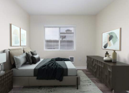 a bedroom with a bed and a dresser and a window at Illumina Apartment Homes, Seattle
