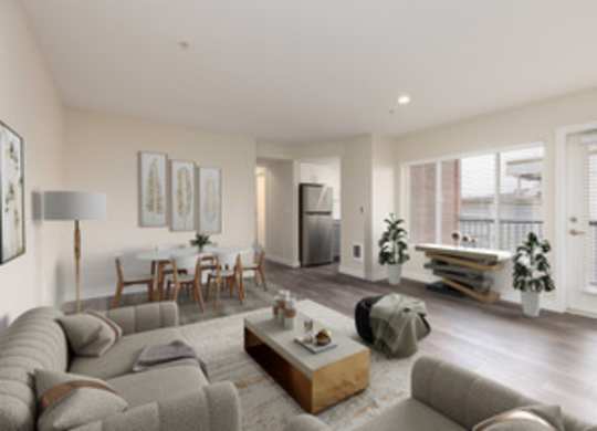 a living room with a couch and a table at Illumina Apartment Homes, Washington, 98102