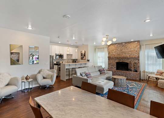 a view of the living room and kitchen from the dining room at Serra Vista Apartment Homes, Washington, 98087