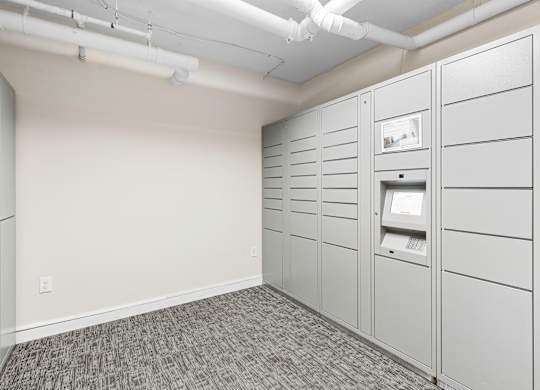 Resident Parcel Receiving Room with Package Lockers and Carpeted Floor at Sir Gallahad Apartment Homes, Washington