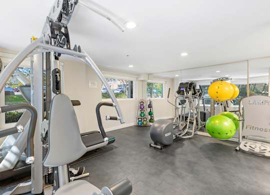 State-of-the-Art Fitness Center with a Variety of Exercise Equipment at Sir Gallahad Apartment Homes, Washington, 98004