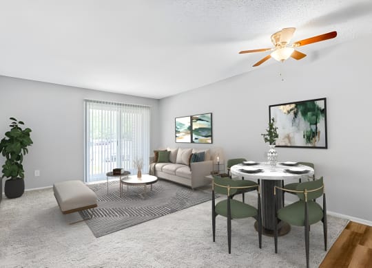 a living and dining room with a ceiling fan and a sliding glass door  at Lakes Edge Apartments, Greensboro, 27409