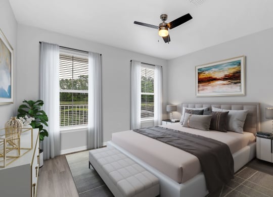 a bedroom with a large bed and two windows at Northlake Park, Orlando, FL