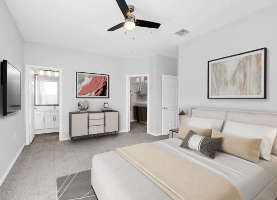 a bedroom with a large bed and a ceiling fan at Northlake Park, Florida, 32827