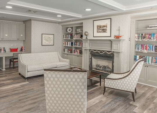 Living room with a fireplace at The Marque, Gainesville, VA, 20155