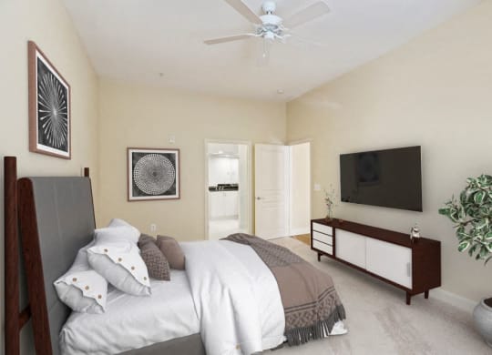 Bedroom with cozy bed and TV at The Mark at Dulles Station, Herndon