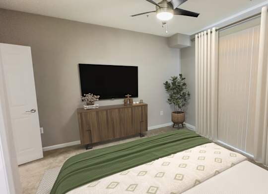Bedroom with TV at Woodland Park, Virginia, 20171