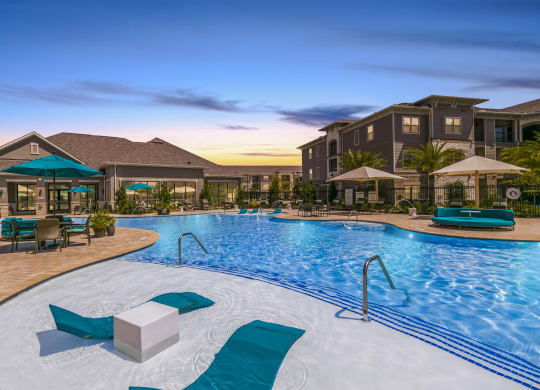 Pool And Sundeck at Cue Luxury Apartments, Cypress, TX, 77433