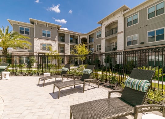 Poolside Sundecks at Cue Luxury Apartments, Cypress