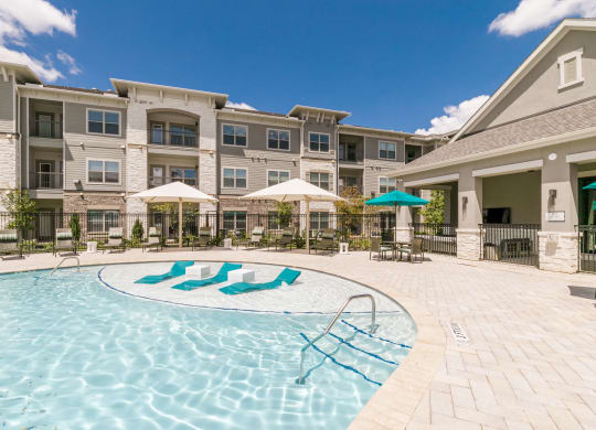 Pool at Cue Luxury Apartments, Cypress, TX