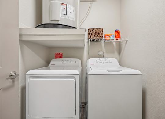 white dryer and washer at Vine + Vail Townhomes and Apartments, Grapevine, 76051