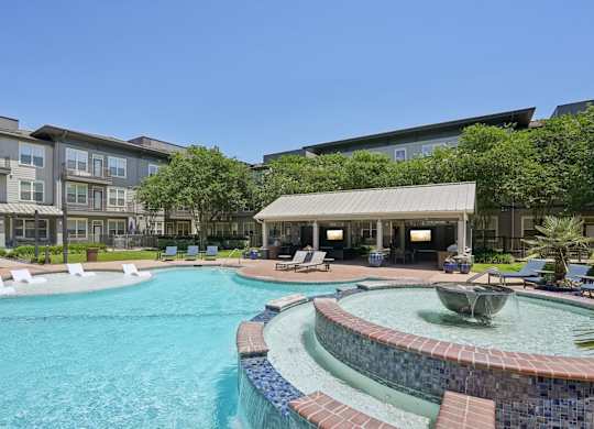 Resort style pool with sun shelf and covered cabana at Highline Urban Lofts Apartments, Texas, 77429